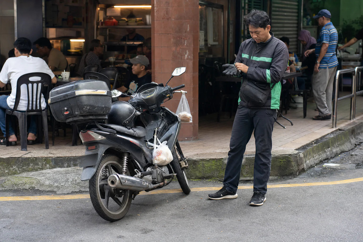 Southeast Asia motorcycle accessories on a street motorcycle in Kuala Lumpur