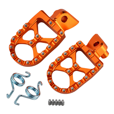 Pair of orange motorcycle foot pegs with springs