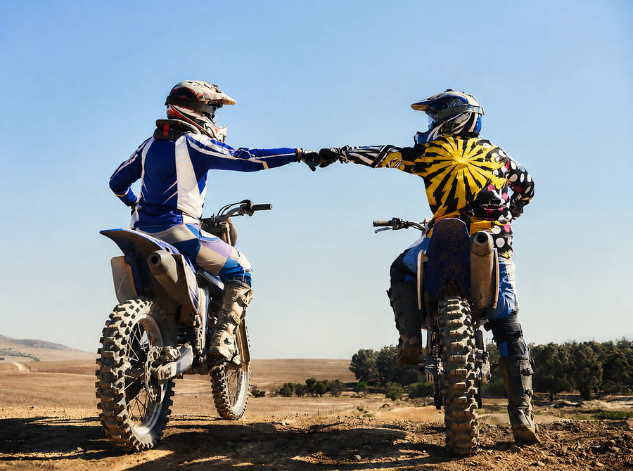 SENBEDER off-road motorcycle riders fist bump trail