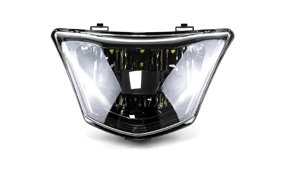 Real catalog motorcycle headlights product photographed on a bright studio background
