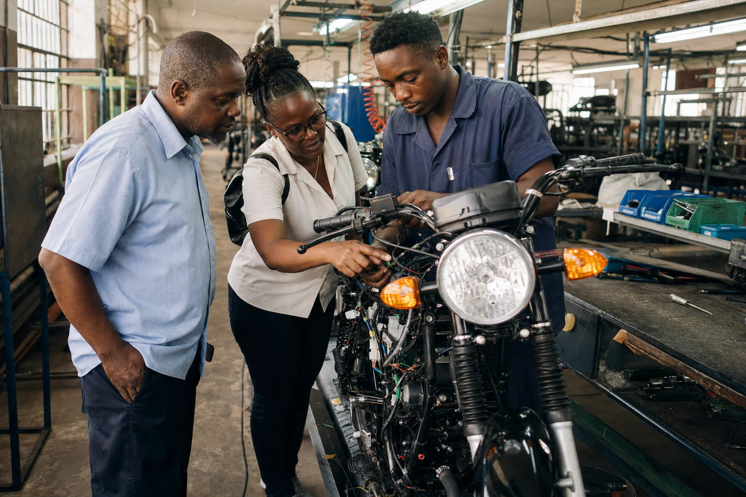 Africa motorcycle parts OEM buyer inspecting production samples